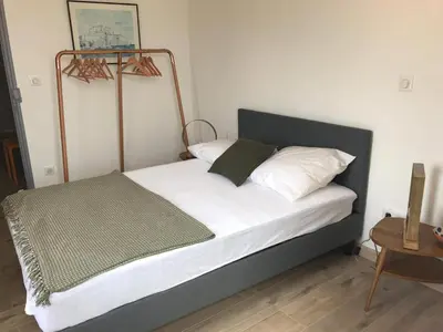 Un ou plusieurs lits dans un hébergement de l'établissement Appartement à Ile Rousse