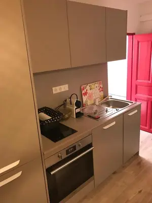 Cuisine ou kitchenette dans l'établissement Appartement à Ile Rousse