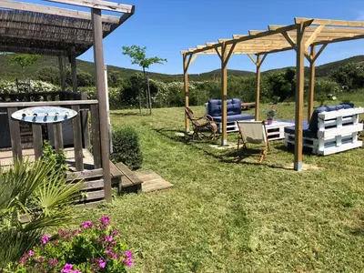 Jardin de l'établissement Mobil home climatisé, bord de mer Macinaggio