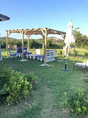 Jardin de l'établissement Mobil home climatisé, bord de mer Macinaggio