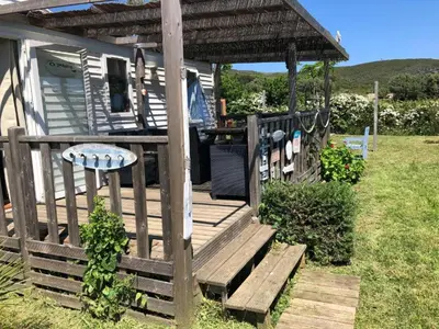 Jardin de l'établissement Mobil home climatisé, bord de mer Macinaggio