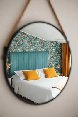 Un ou plusieurs lits dans un hébergement de l'établissement Hôtel & Résidence San Roccu