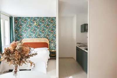 Un ou plusieurs lits dans un hébergement de l'établissement Hôtel & Résidence San Roccu