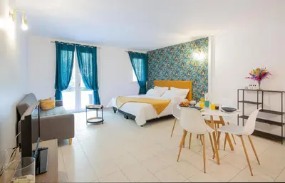 Un ou plusieurs lits dans un hébergement de l'établissement Hôtel & Résidence San Roccu