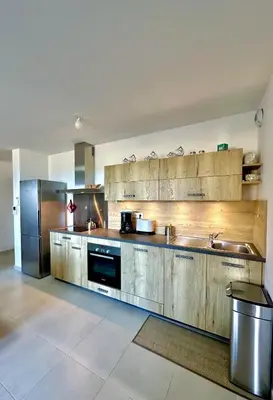 Cuisine ou kitchenette dans l'établissement Appartement CUMARU vue mer