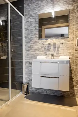 Salle de bains dans l'établissement Hôtel Le Bastia