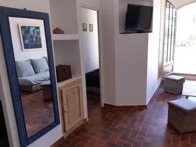 Télévision ou salle de divertissement dans l'établissement T2 rénové 100m plage avec SPA privatif entre calvi et ile rousse