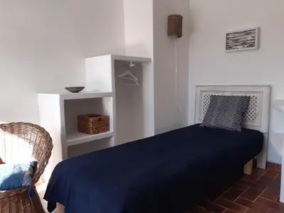 Un ou plusieurs lits dans un hébergement de l'établissement T2 rénové 100m plage avec SPA privatif entre calvi et ile rousse