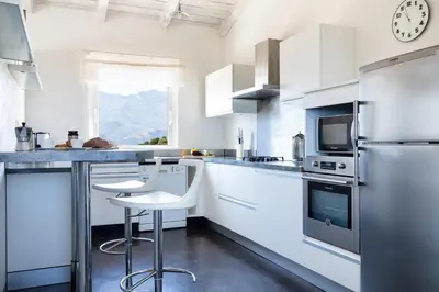 Cuisine ou kitchenette dans l'établissement U CASALE