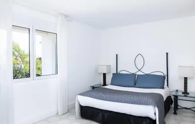 Un ou plusieurs lits dans un hébergement de l'établissement VILLA CALA ROSSA