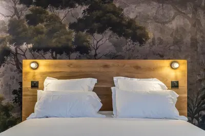 Un ou plusieurs lits dans un hébergement de l'établissement Monsieur Miot Concept Hotel - Bastia centre