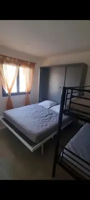 Un ou plusieurs lits dans un hébergement de l'établissement Maison U nidu à 500m de la mer
