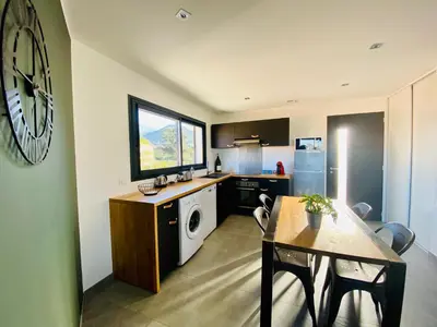 Cuisine ou kitchenette dans l'établissement T2 Loft entre mer et montagne