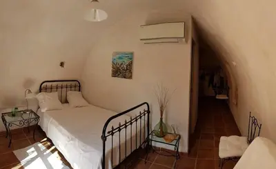 Un ou plusieurs lits dans un hébergement de l'établissement Auberge Pietra Monetta