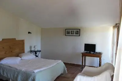 Un ou plusieurs lits dans un hébergement de l'établissement Auberge Pietra Monetta
