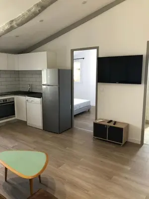 Cuisine ou kitchenette dans l'établissement Appartement Place du Marché Bastia