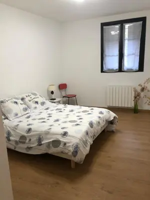 Un ou plusieurs lits dans un hébergement de l'établissement Maison au centre d'un village typique
