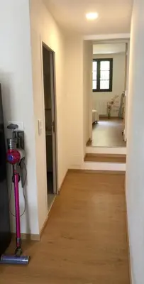 Un ou plusieurs lits dans un hébergement de l'établissement Maison au centre d'un village typique