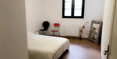Un ou plusieurs lits dans un hébergement de l'établissement Maison au centre d'un village typique