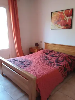 Un ou plusieurs lits dans un hébergement de l'établissement Chambres d hotes chez raymonde et sandrine