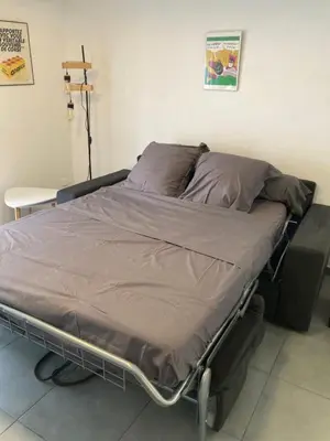 Un ou plusieurs lits dans un hébergement de l'établissement Charmant T1 Bastia