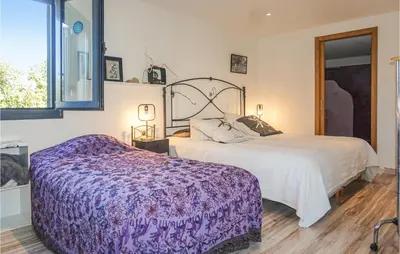 Un ou plusieurs lits dans un hébergement de l'établissement 3 Bedroom Awesome Home In Calenzana
