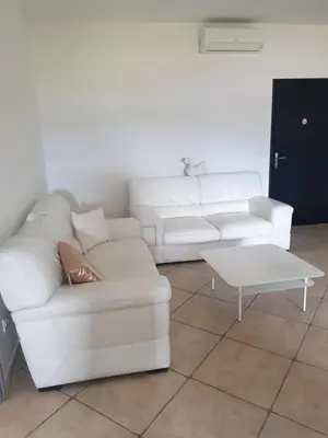 Coin salon dans l'établissement appartement tra mare e monti