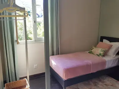 Un ou plusieurs lits dans un hébergement de l'établissement Aroma Green Villa