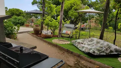 Jardin de l'établissement Aroma Green Villa