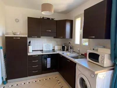 Cuisine ou kitchenette dans l'établissement Appartement Dolce Farniente Corse Lozari
