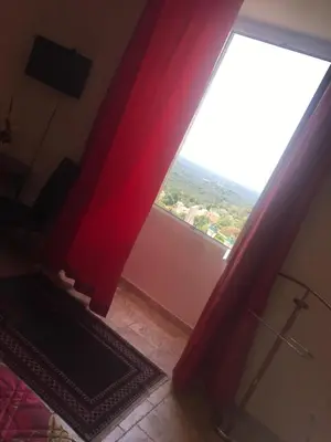 Télévision ou salle de divertissement dans l'établissement A Balamata