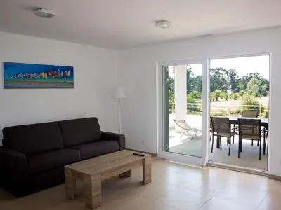 Coin salon dans l'établissement Apartment A Suara Linda-2 by Interhome