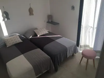 Un ou plusieurs lits dans un hébergement de l'établissement Villa grand confort à 500m de la plage de LOZARI