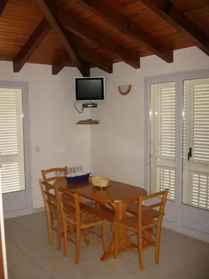 Télévision ou salle de divertissement dans l'établissement Terrasse de Malbeccu