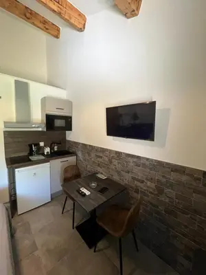 Cuisine ou kitchenette dans l'établissement Le Relais de Sisco