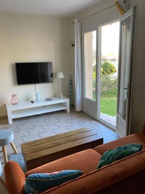 Télévision ou salle de divertissement dans l'établissement Appartement PALAZZI 2