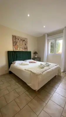 Un ou plusieurs lits dans un hébergement de l'établissement Appartement PALAZZI 1