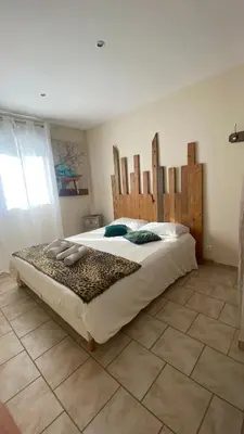 Un ou plusieurs lits dans un hébergement de l'établissement Appartement PALAZZI 1