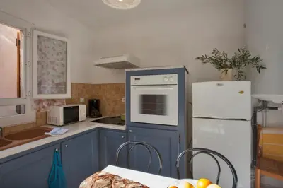 Cuisine ou kitchenette dans l'établissement Domaine Bollaccia - Casa Ostriconi