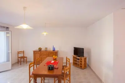Télévision ou salle de divertissement dans l'établissement Domaine Bollaccia - Casa Caruchettu