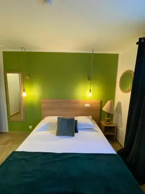 Un ou plusieurs lits dans un hébergement de l'établissement Hotel U Catagnu