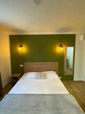 Un ou plusieurs lits dans un hébergement de l'établissement Hotel U Catagnu