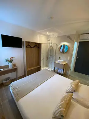 Un ou plusieurs lits dans un hébergement de l'établissement Hotel U Catagnu