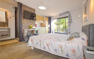 Cuisine ou kitchenette dans l'établissement Corse et Zen BULLE ZEN 25 m² 2 pers + Bébé