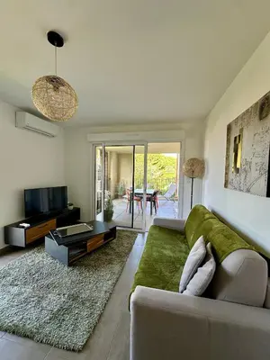 Coin salon dans l'établissement Appartement COCON vue mer