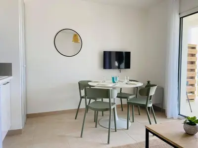 Télévision ou salle de divertissement dans l'établissement Résidence Marina Di Bravone