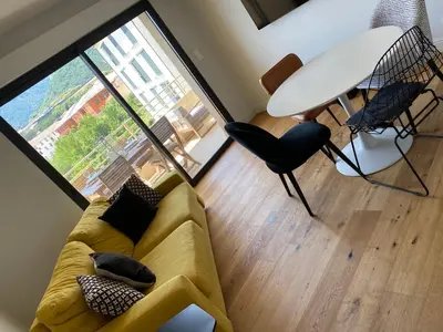 Coin salon dans l'établissement Appartements de Standing - Panate