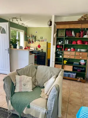 Cuisine ou kitchenette dans l'établissement un ecrin de verdure face à la mer