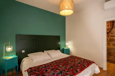 Un ou plusieurs lits dans un hébergement de l'établissement Maison de Charme-A STALLA- Entre Mer et Montagne