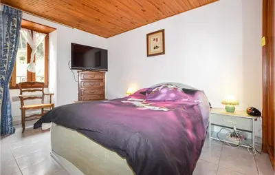 Un ou plusieurs lits dans un hébergement de l'établissement Amazing Home In Morosaglia With Wifi